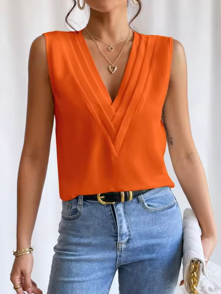 Sleeveless Women's Blouse With V Neck And Elegant Pleats