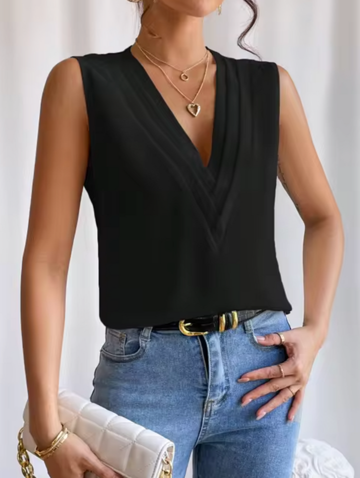 Sleeveless Women's Blouse With V Neck And Elegant Pleats