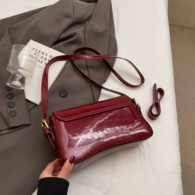 Tira | Shiny Shoulder Bag with Wavy Design
