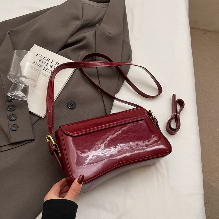 Tira | Shiny Shoulder Bag with Wavy Design