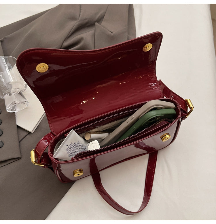 Tira | Shiny Shoulder Bag with Wavy Design