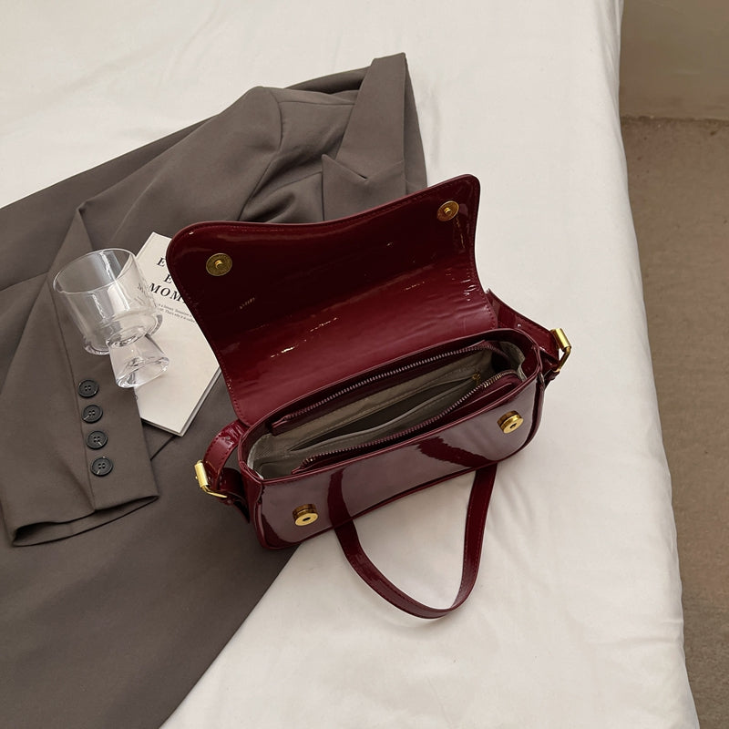 Tira | Shiny Shoulder Bag with Wavy Design