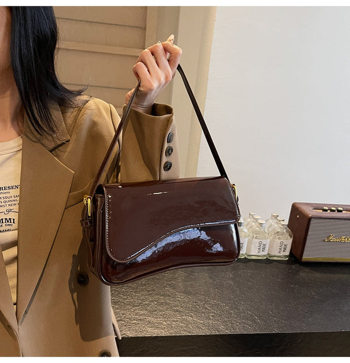Tira | Shiny Shoulder Bag with Wavy Design