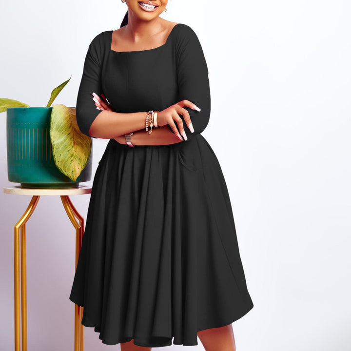 Kelli | Elegant Midi Dress with Bow Detail and 3/4 Sleeves