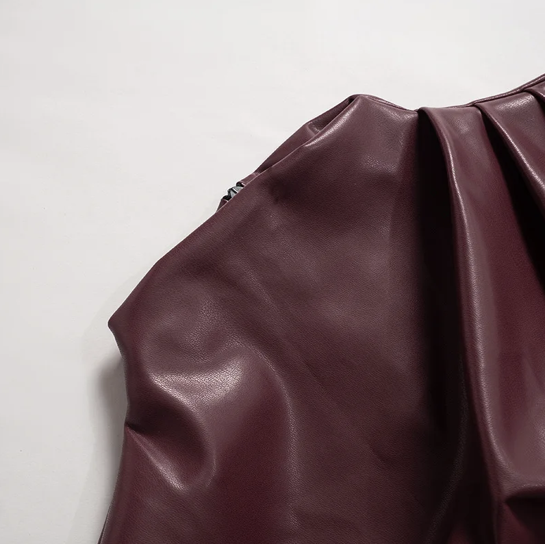 Stylish Women's Leather Top with Sleeveless Design and Draped Neckline