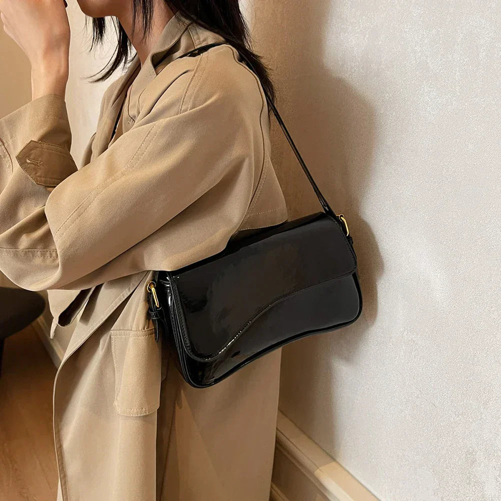 Tira | Shiny Shoulder Bag with Wavy Design