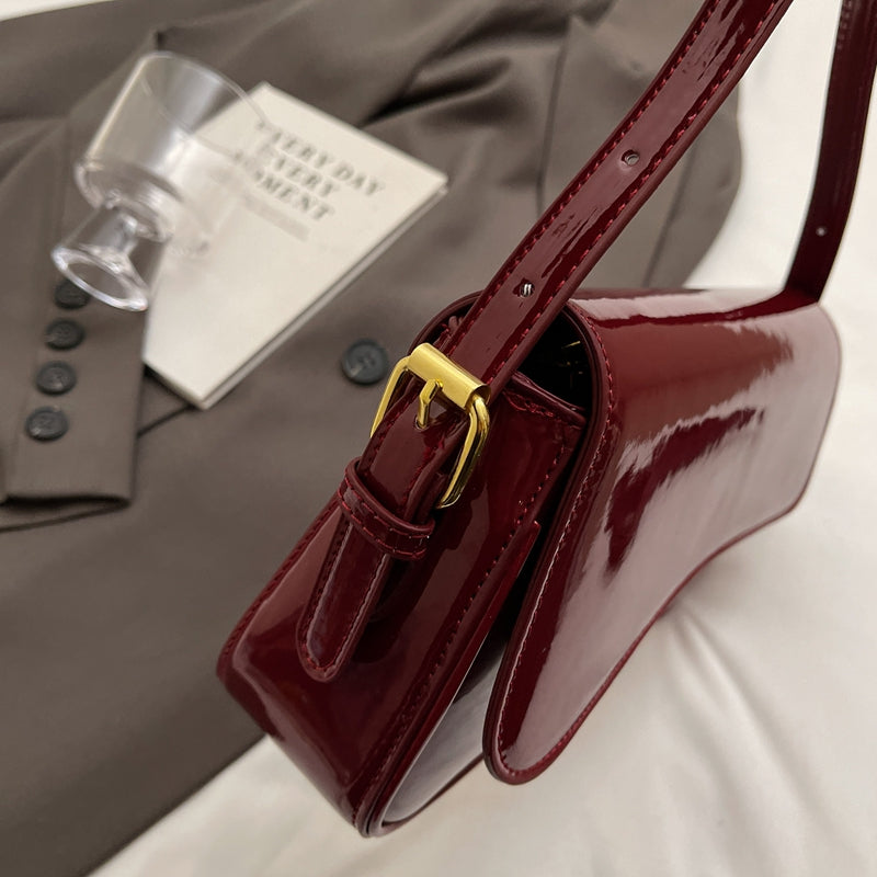 Tira | Shiny Shoulder Bag with Wavy Design