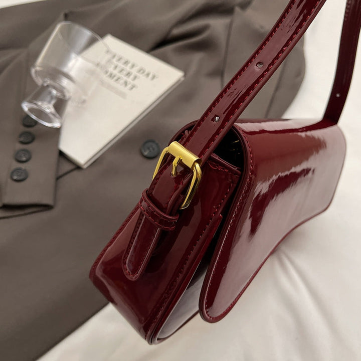 Tira | Shiny Shoulder Bag with Wavy Design
